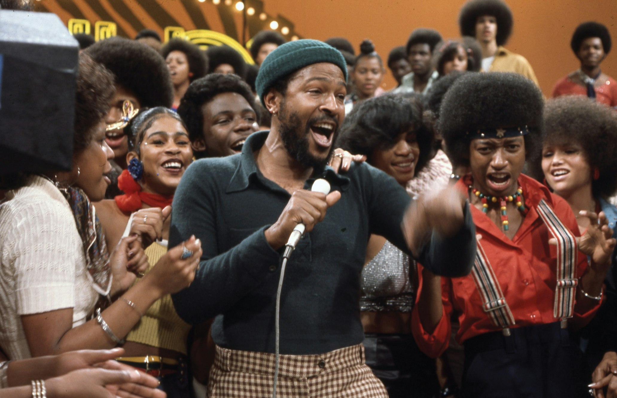 Marvin Gaye singing “Let’s Get It On” on <i>Soul Train</i> (Episode 89, February 16, 1974). Photo via Soul Train/Getty Images.